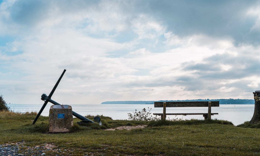 Photograph of a bench near the coast